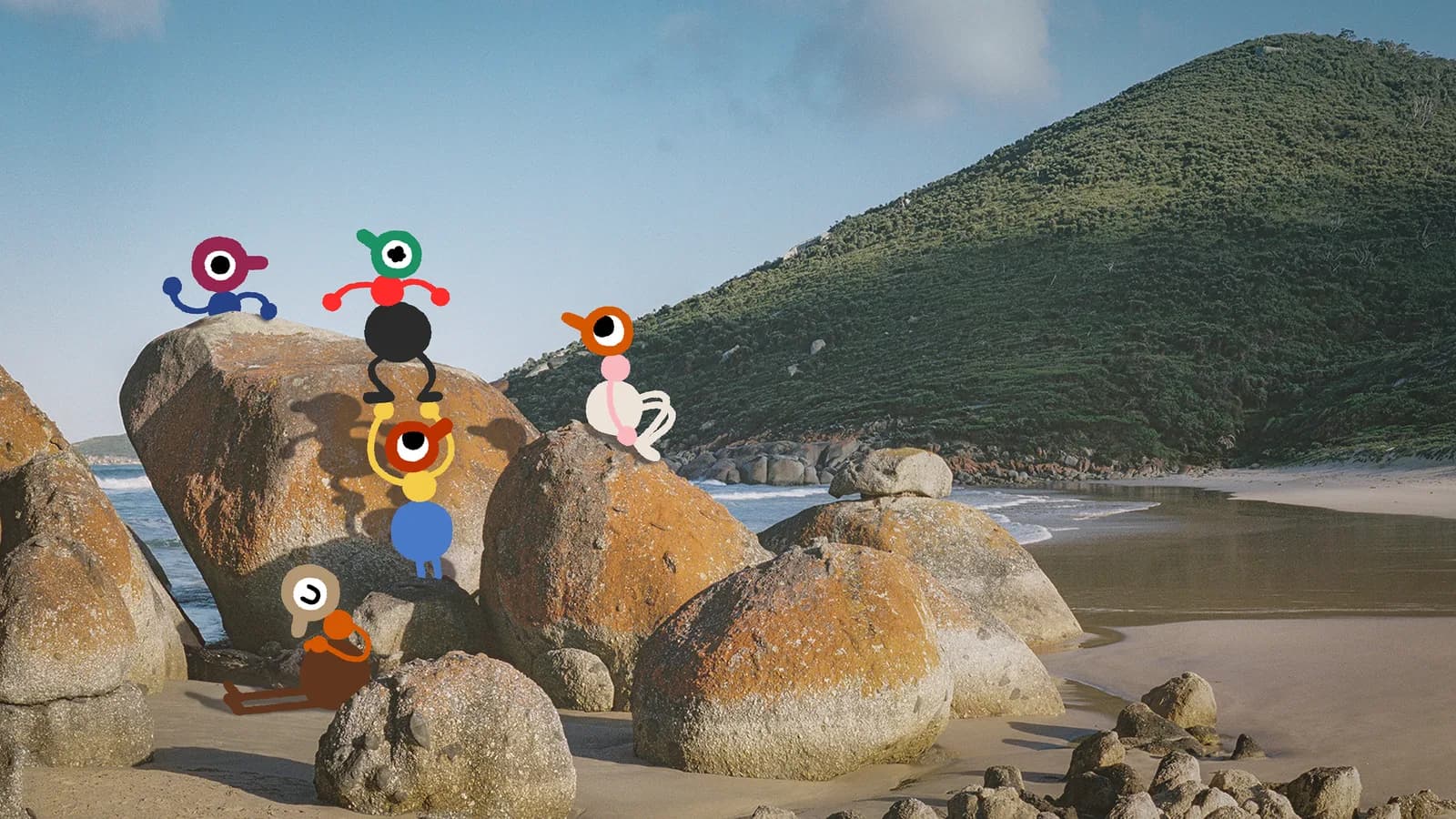 Colorful characters gathered among coastal boulders